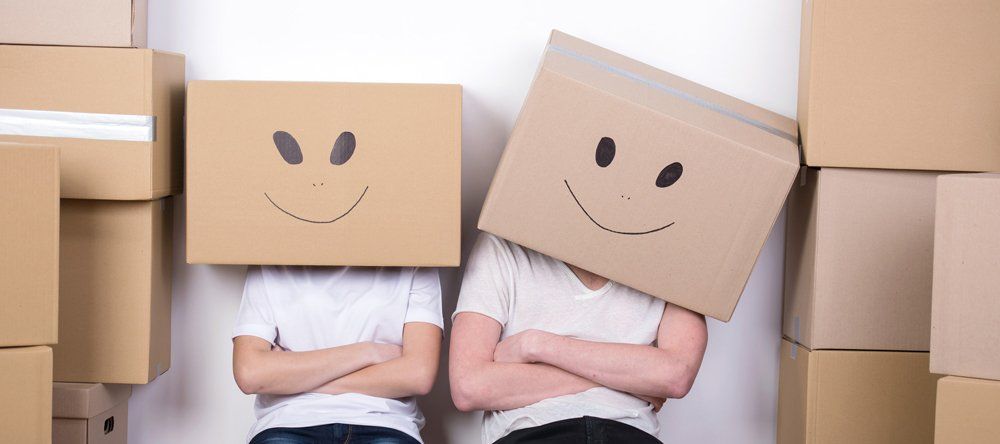 carton boxes with a smiley on them