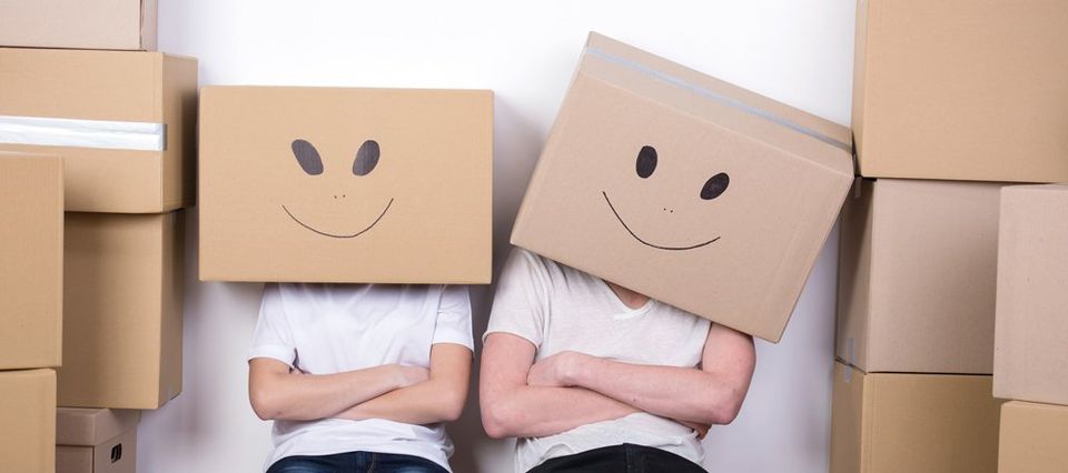 carton boxes with smiley on them