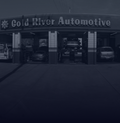Gold River Automotive service garage exterior with several cars parked in bays - Gold River Automotive