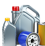 Two plastic motor oil containers with red and yellow caps, a blue oil filter, and a yellow cylindrical oil filter element - Gold River Automotive