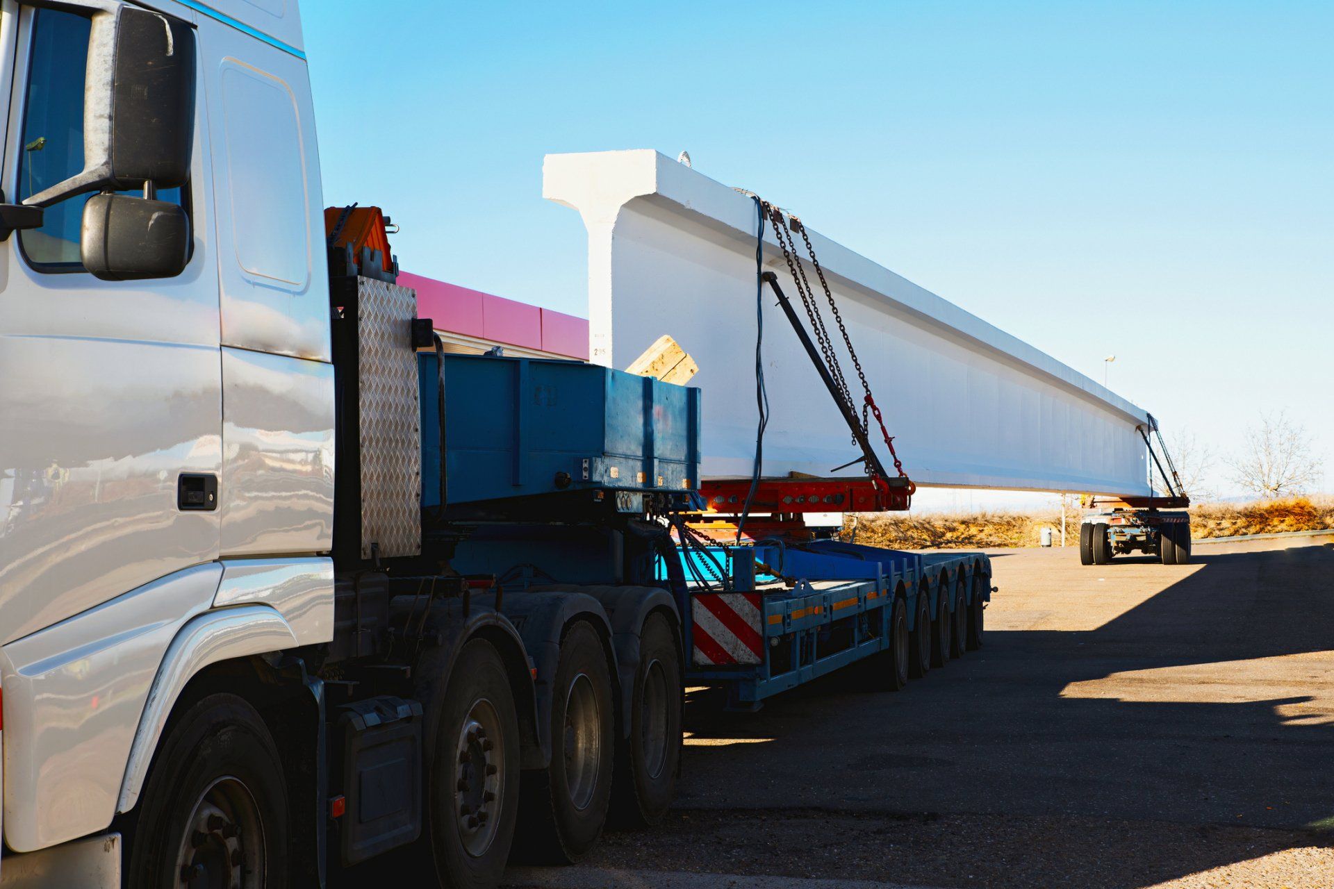 Truck Transporting Large Concrete Beams – Las Vegas, NV – Dielco Crane Service