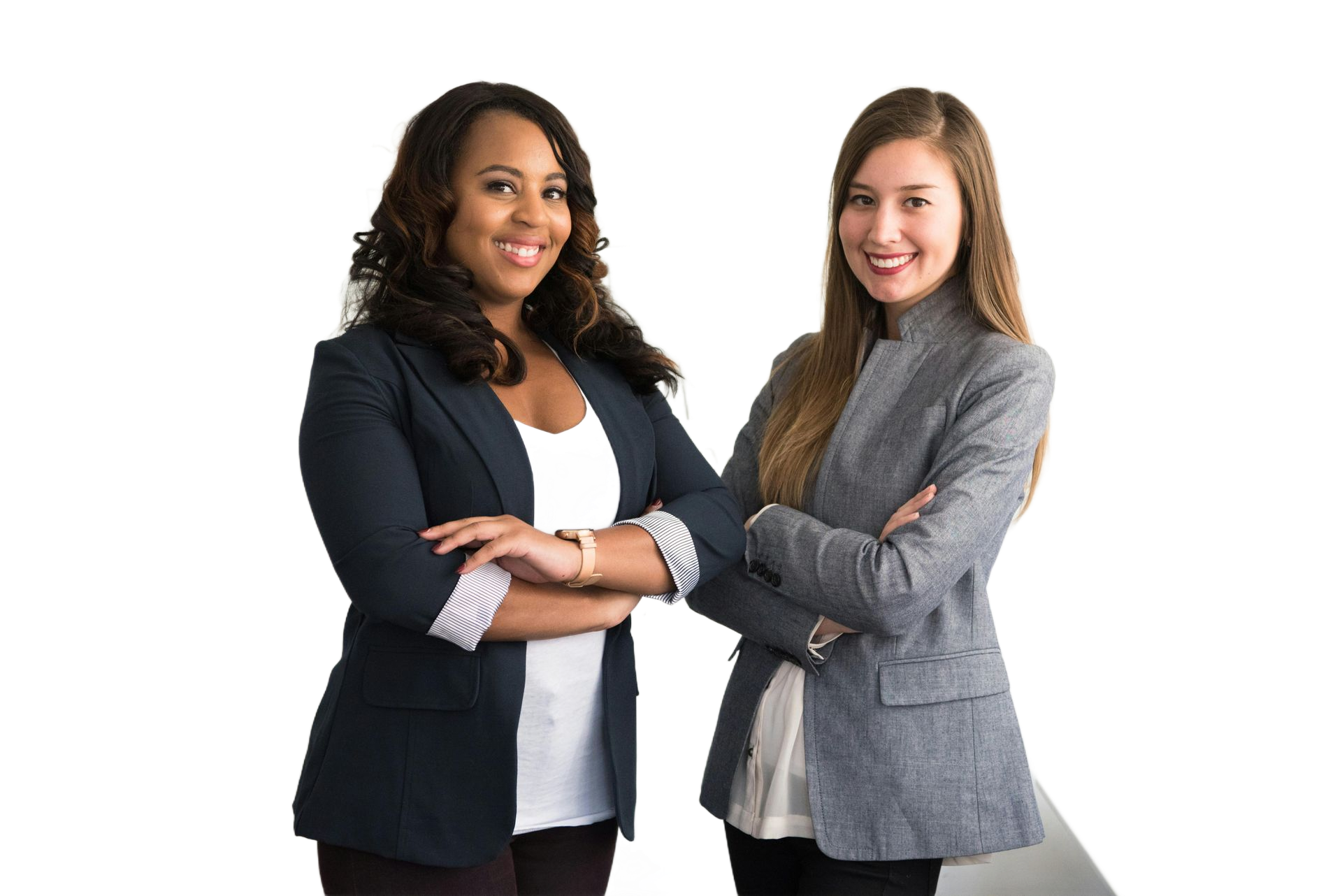 Two professional women standing next to each other with arms crossed.