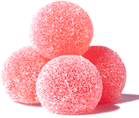 Four pink, round candies coated in sugar, stacked together.