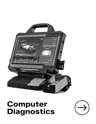 Tough tablet computer on a docking station displaying vehicle diagnostics.