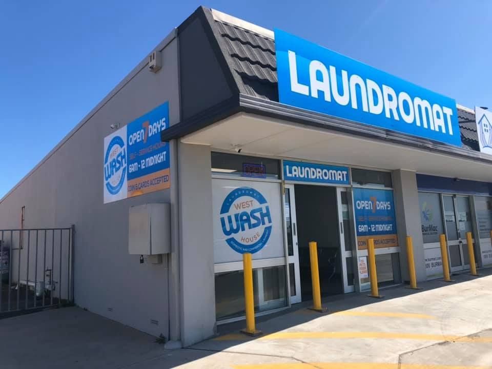 A Laundromat With a Blue Sign Above the Door — The Wash House& Laundrette in Dubbo, NSW