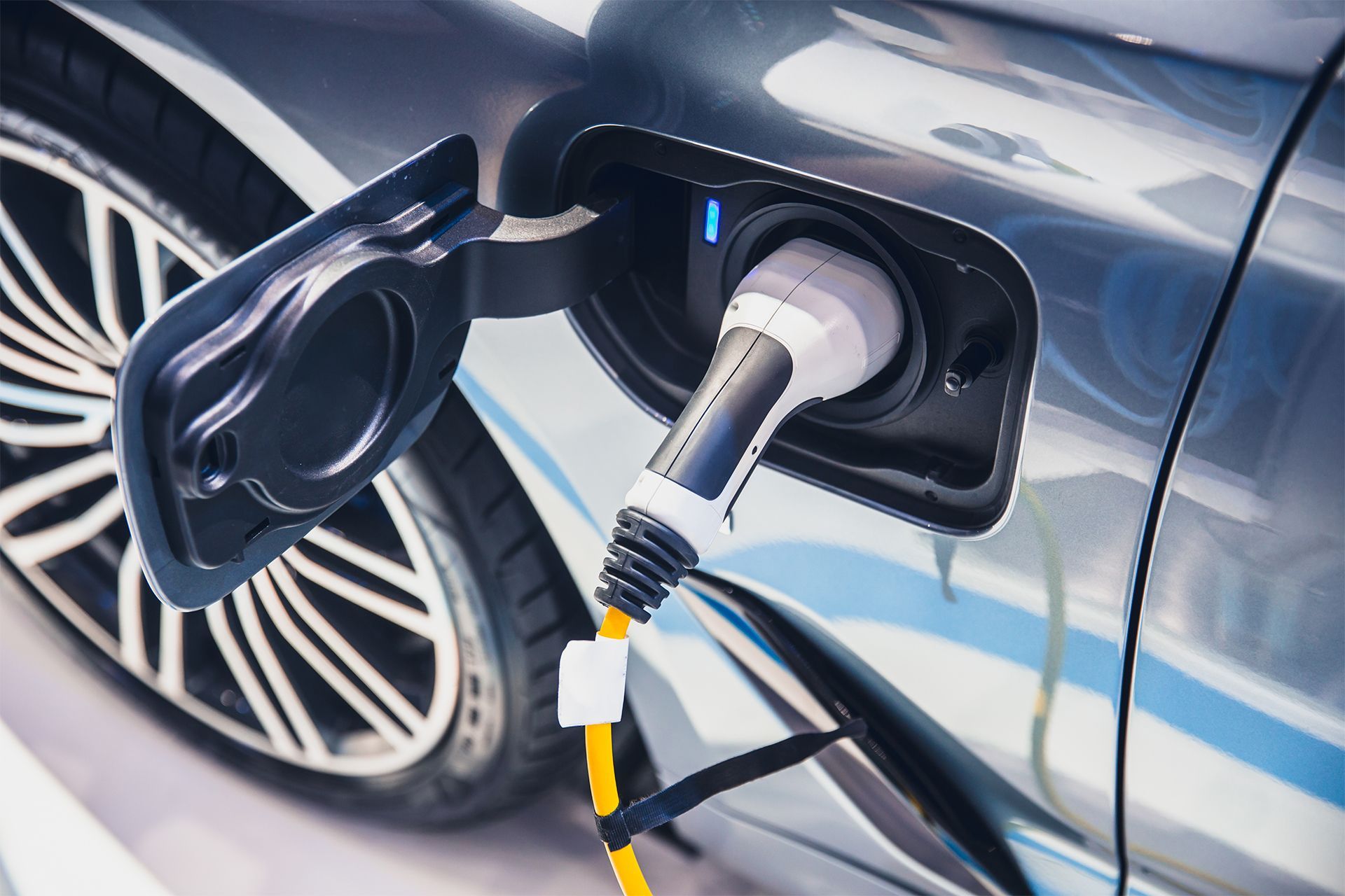 An electric car is being charged