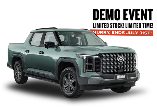 Green pickup truck on a white background with a large grill and black accents.