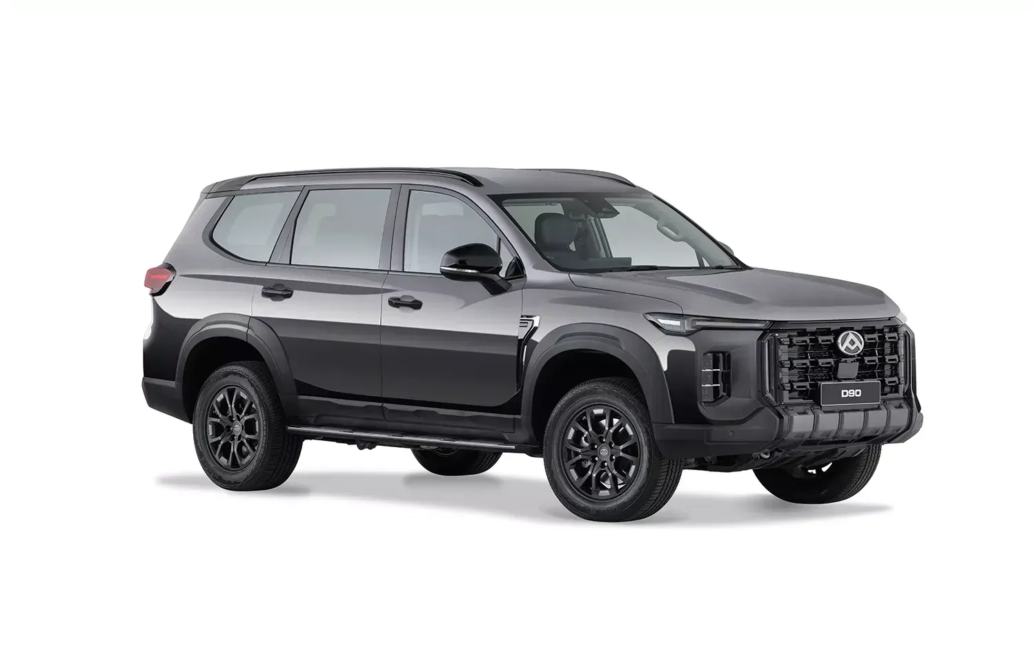 Dark gray SUV with black wheels on a white background.