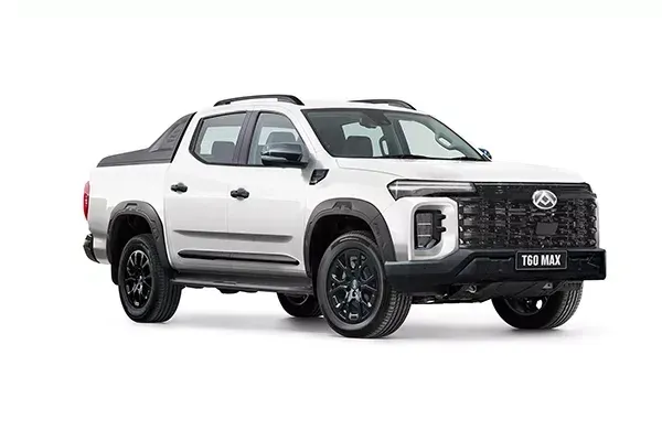 White pickup truck with black wheels, grille, and trim, angled from the front.