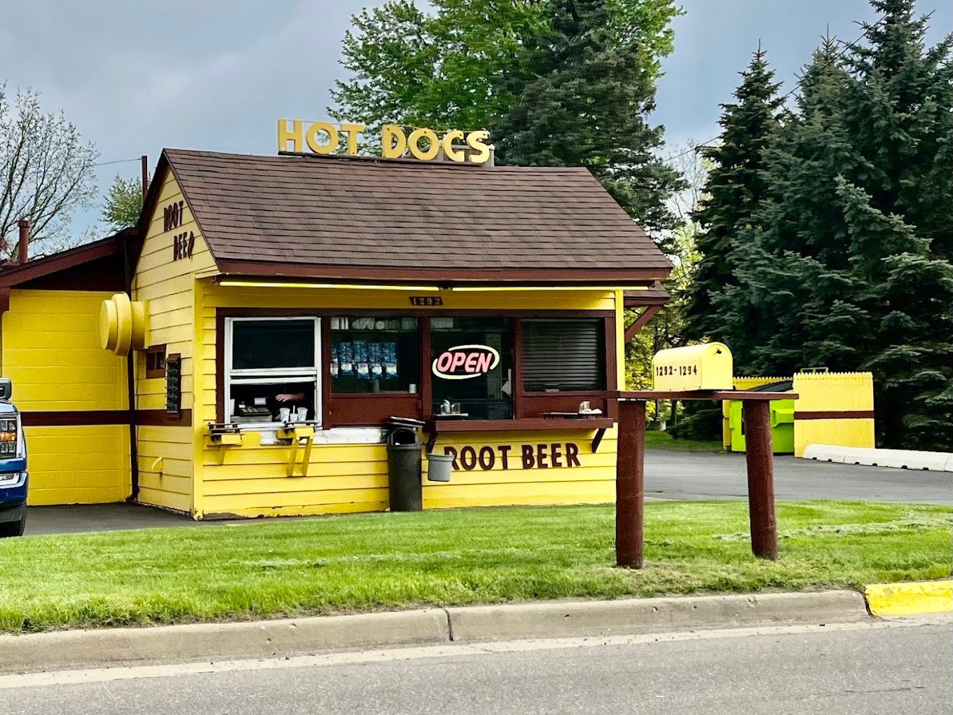 A yellow building with the word hot dogs on top Bill Hot Dog Ypsilanti MI