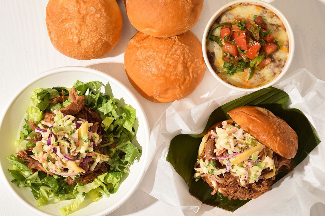 A bunch of food including a sandwich and a bowl of soup Frita Batidos Ann Arbor