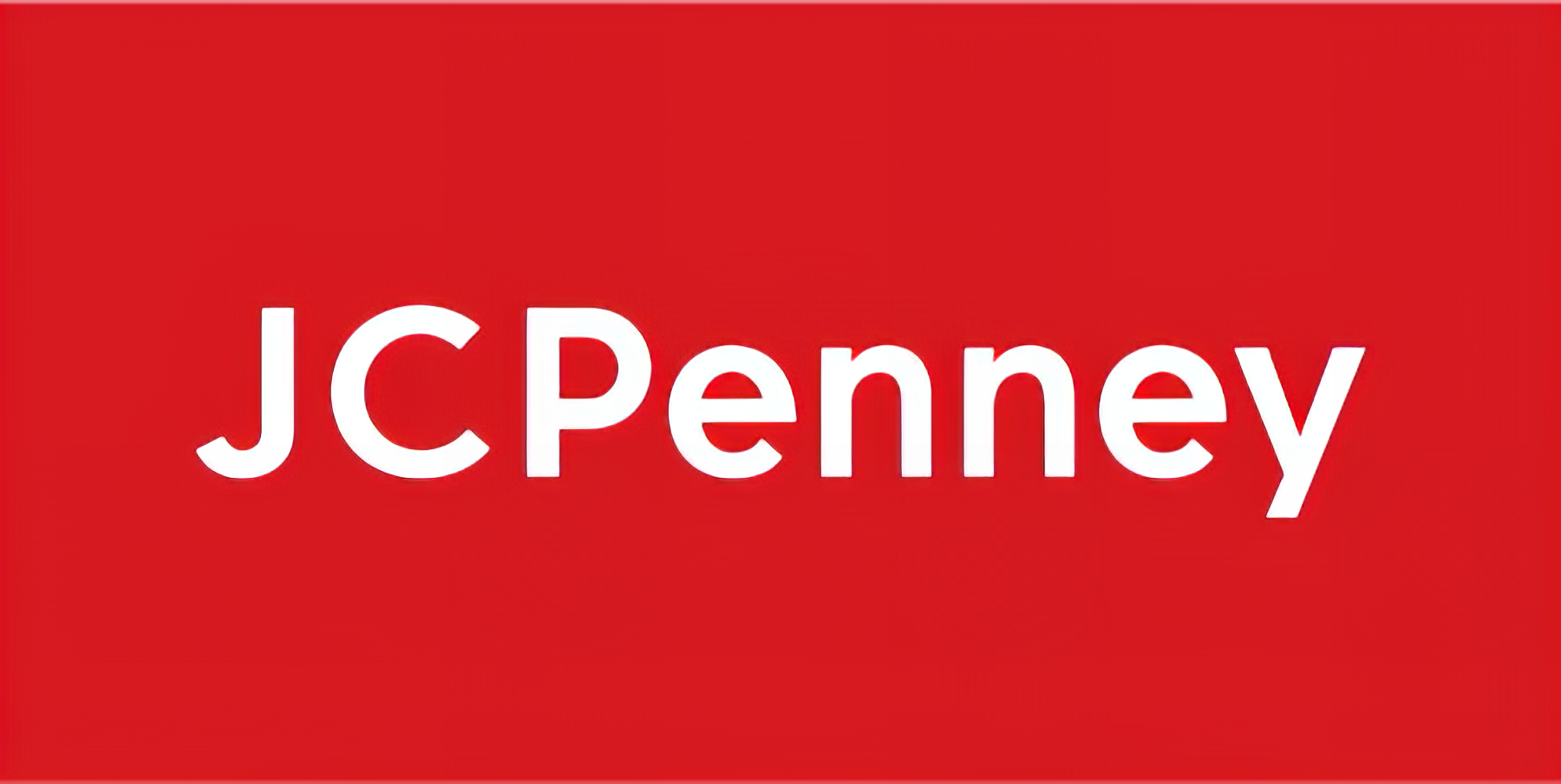 A red sign that says jcpenney on it