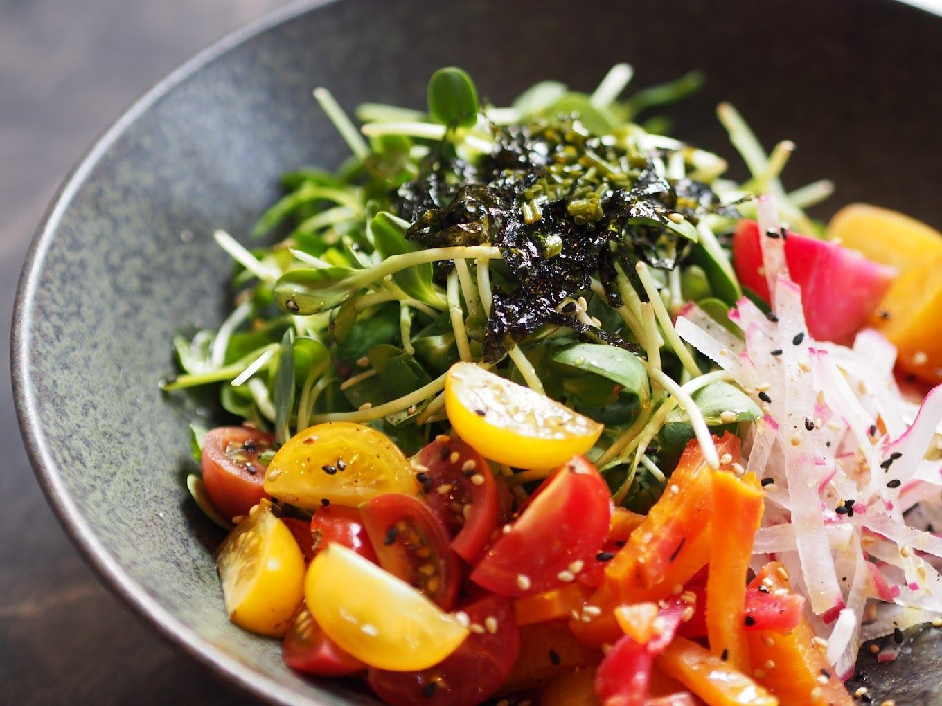 A close up of a salad in a bowl on a table Miss Kim Korean Food Restaurant Ann Arbor MI
