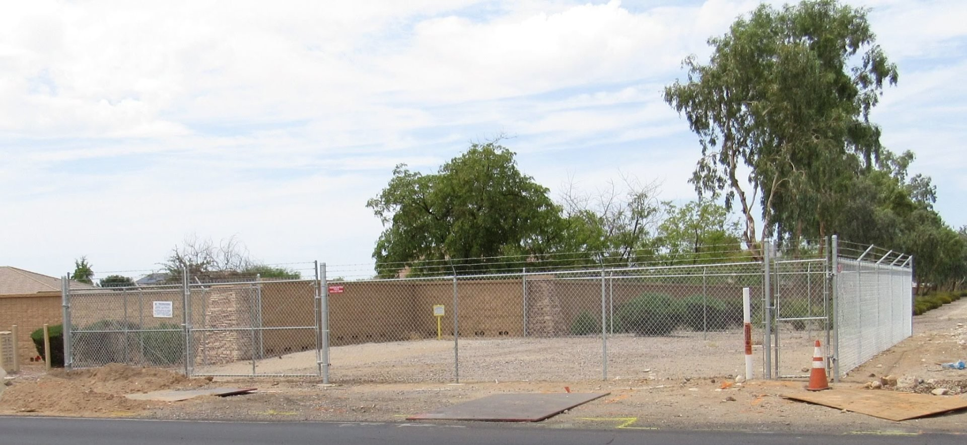 Chain Link Enclosure with Barb Wire