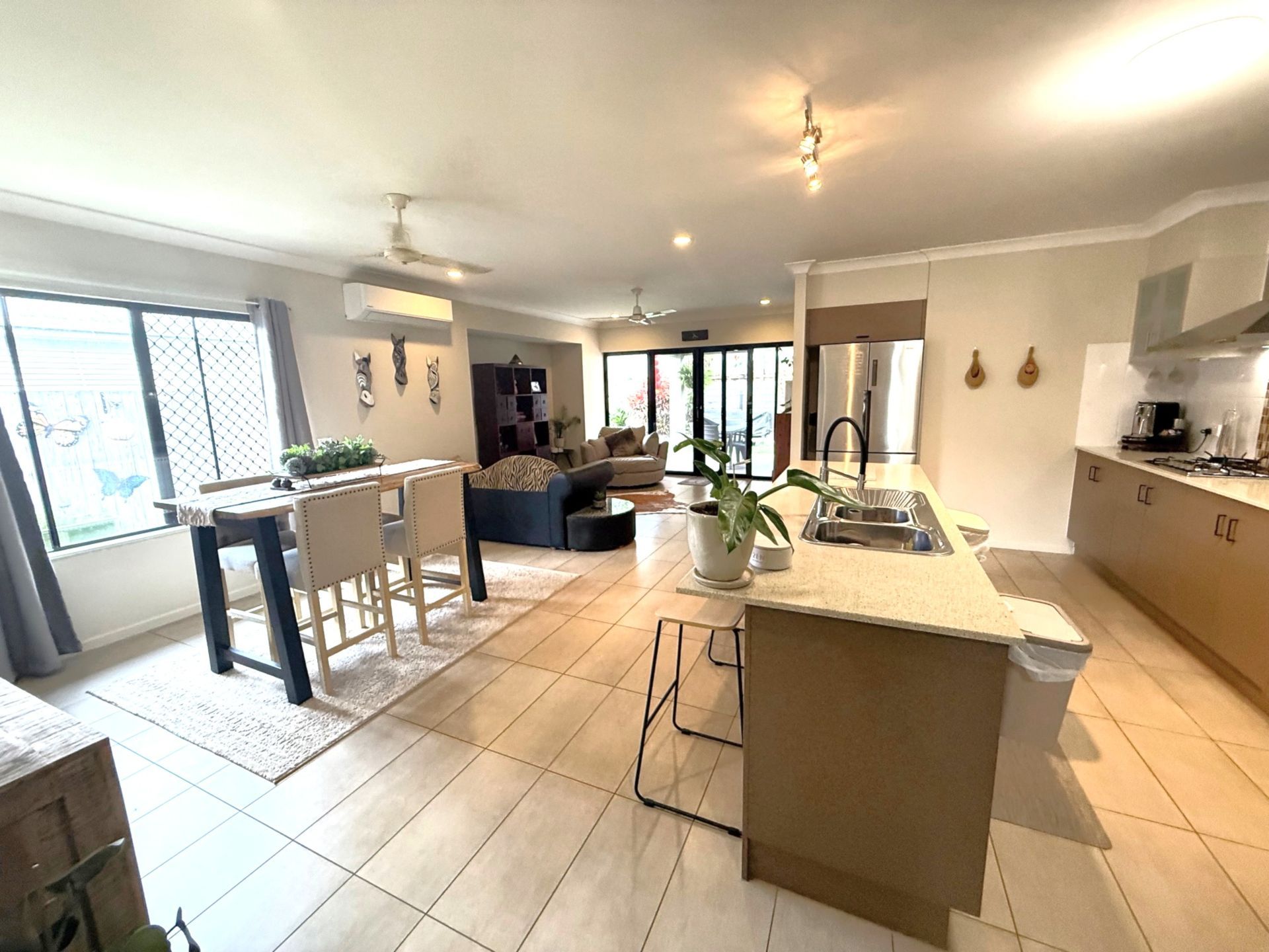 There Is A Ceiling Fan In The Corner Of The Room — Rental Revolution In Manoora, QLD