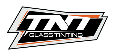 Logo for TNT Glass Tinting, featuring the white text "TNT" above "GLASS TINTING" on a black, orange, and grey background.