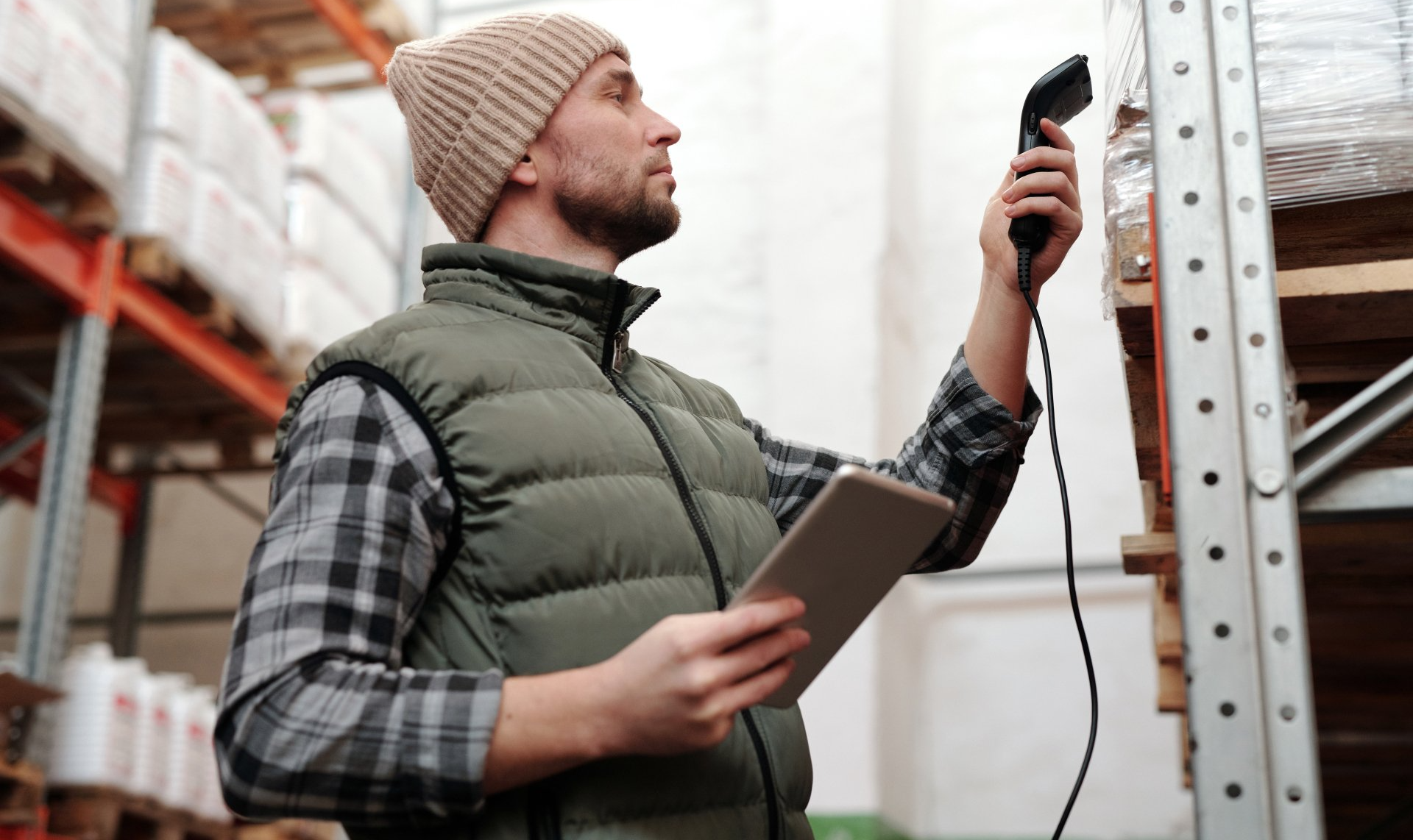 man scanning home security inventory