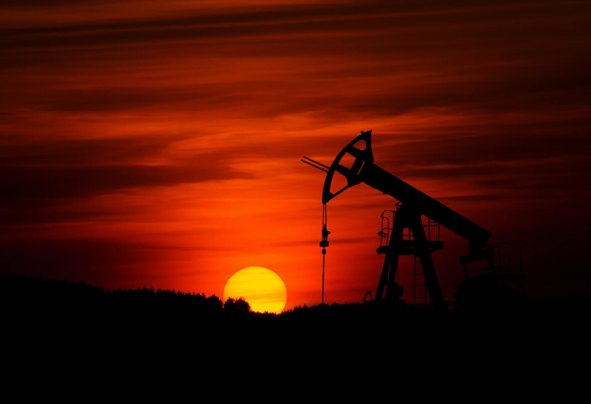 Sunset with oil pumps in silhouette