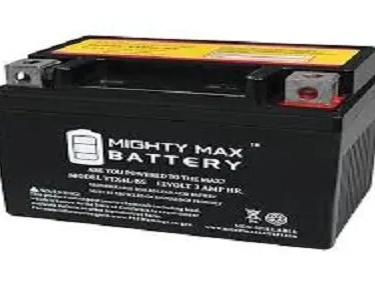 Black Mighty Max battery with yellow label and silver terminals.