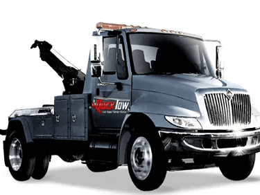 Gray tow truck with raised boom, ready to tow.