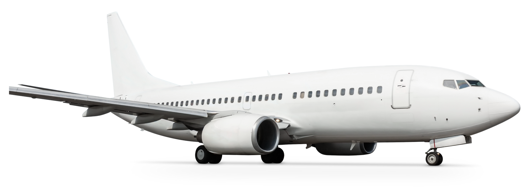 Un avión blanco está sentado en el suelo sobre un fondo blanco.