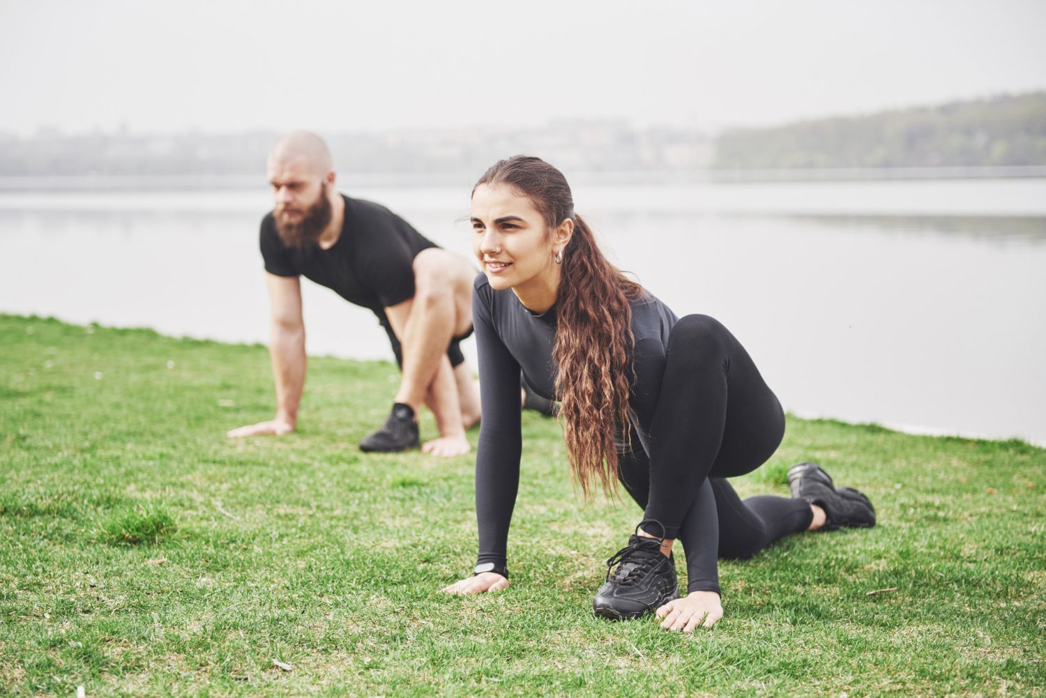 two people working out outdoors