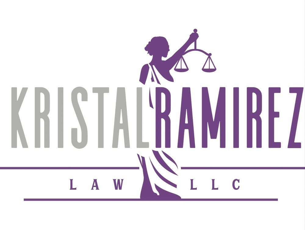 A purple logo for a law firm with a woman holding scales of justice.
