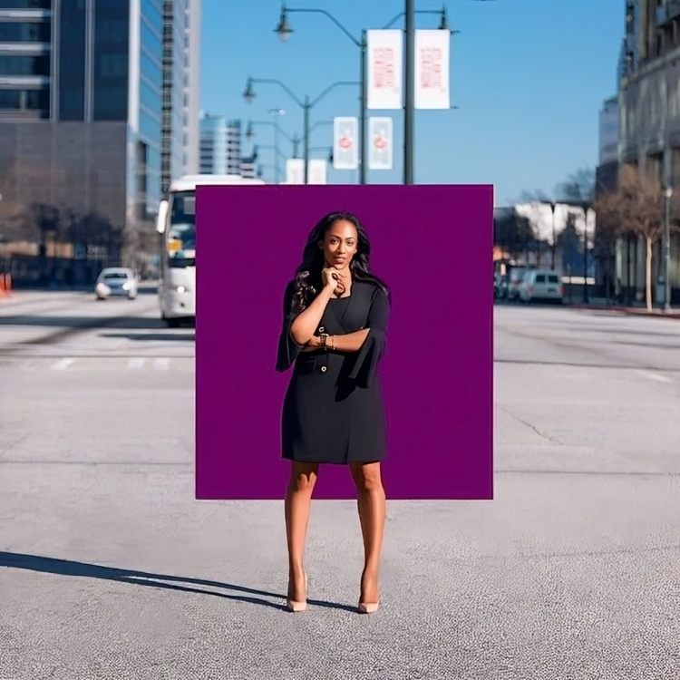 A woman in a black dress is standing in front of a purple square.