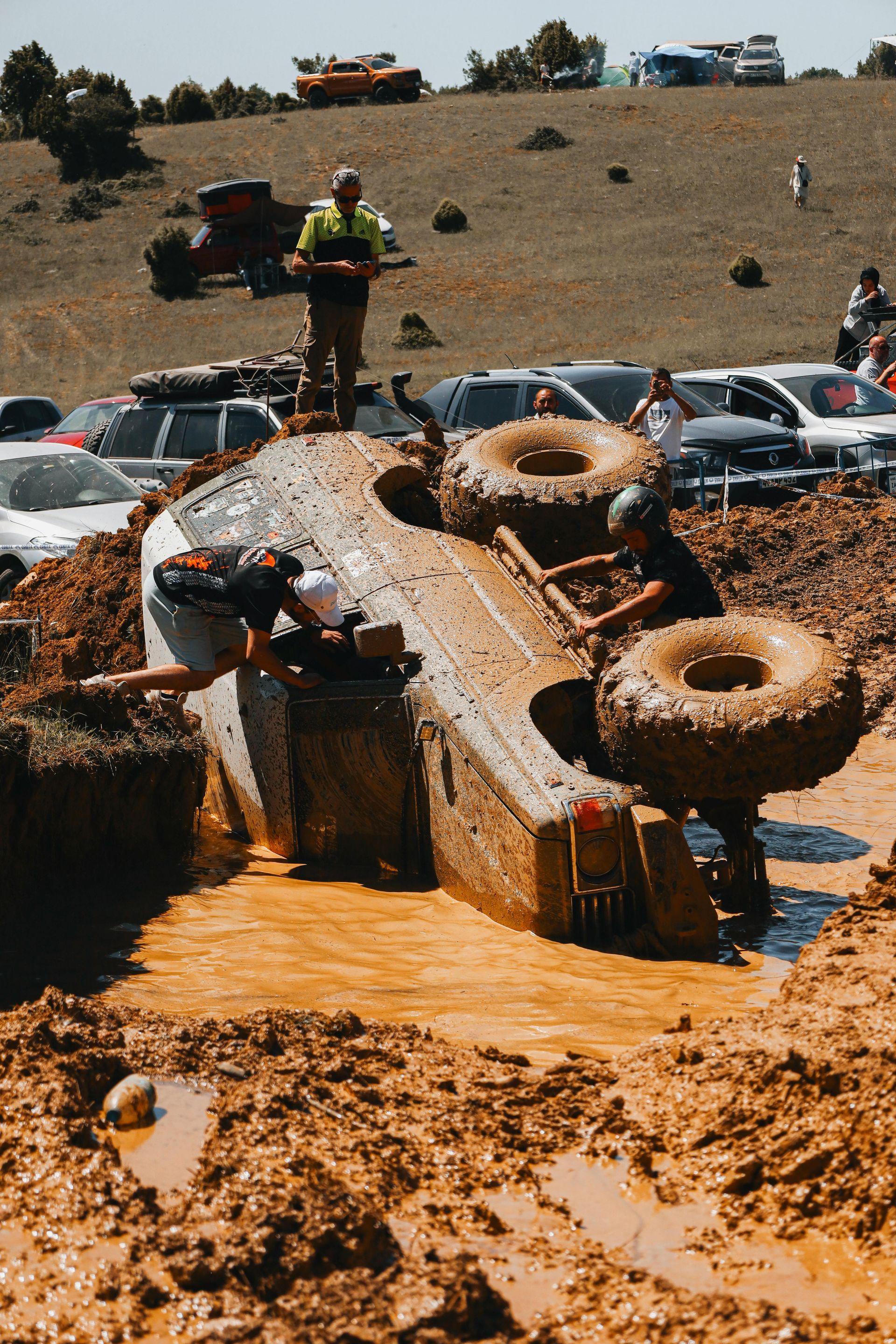 off-road vehicl over turned in mud, 4x4 s stuck in mud, off-roading gone wrong