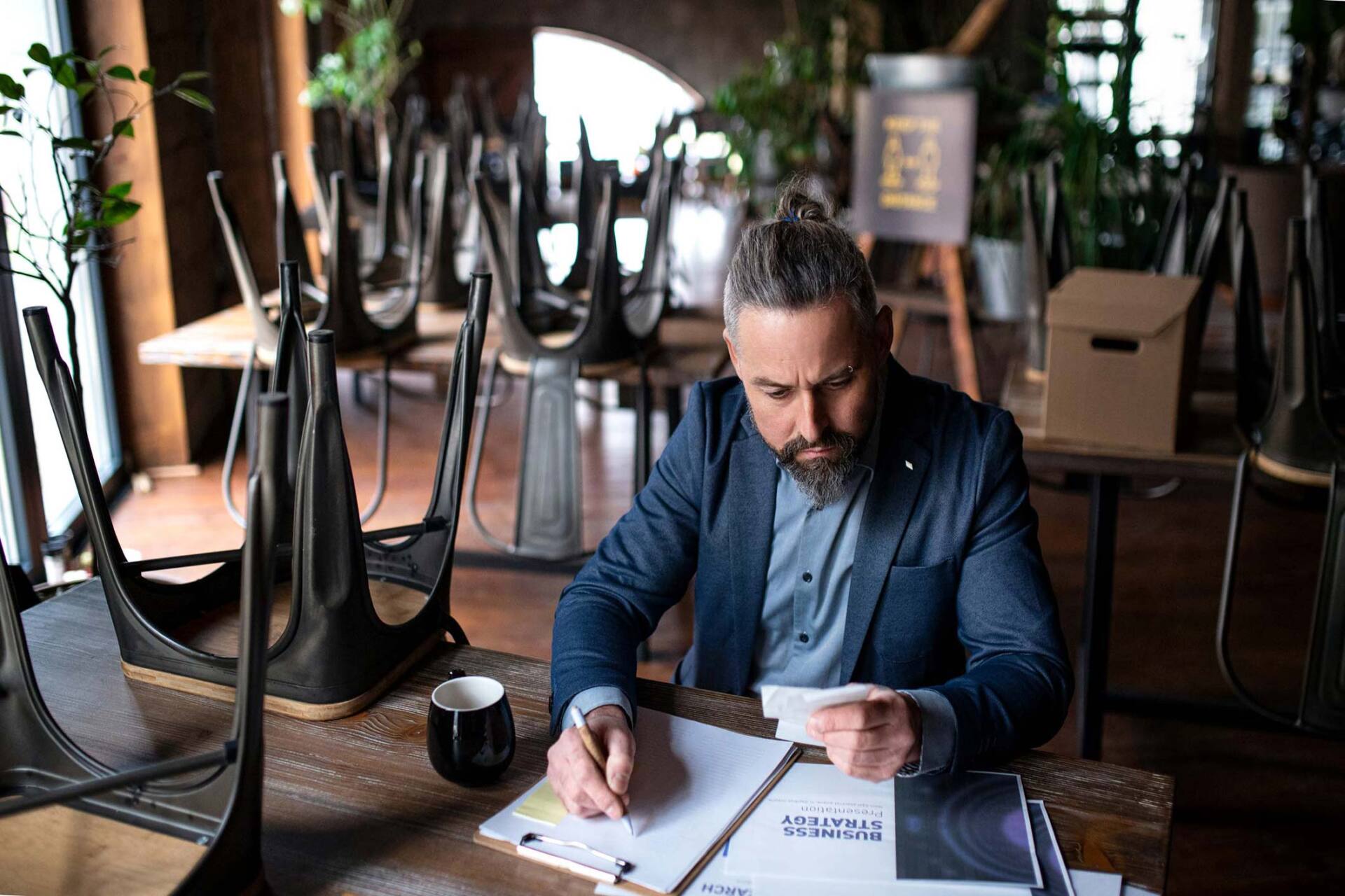 Business man looking at papers — Jacksonville, FL — Beaches Family Law