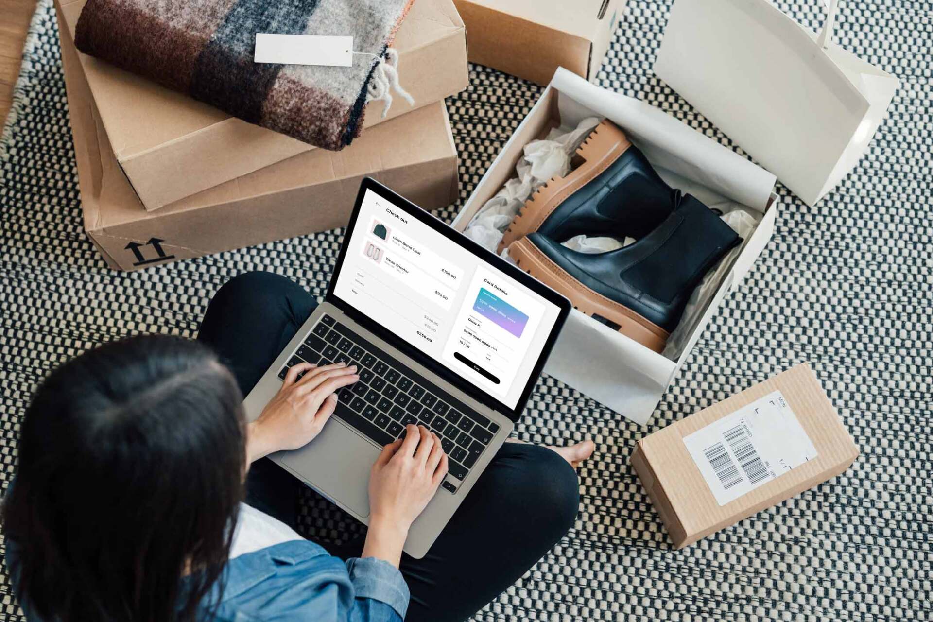 Woman using laptop next to boxes — Jacksonville, FL — Beaches Family Law