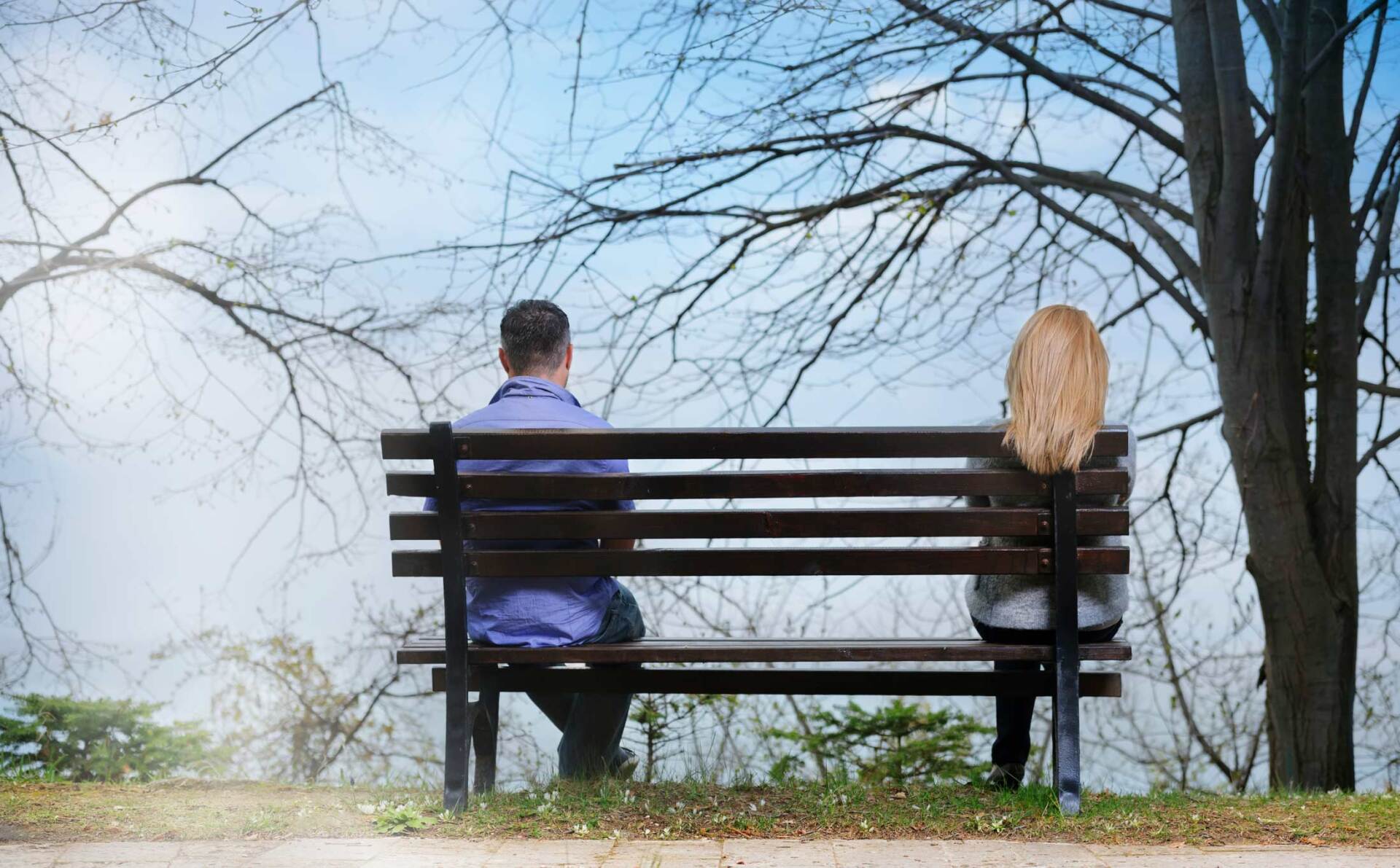 Man and woman on bench — Jacksonville, FL — Beaches Family Law
