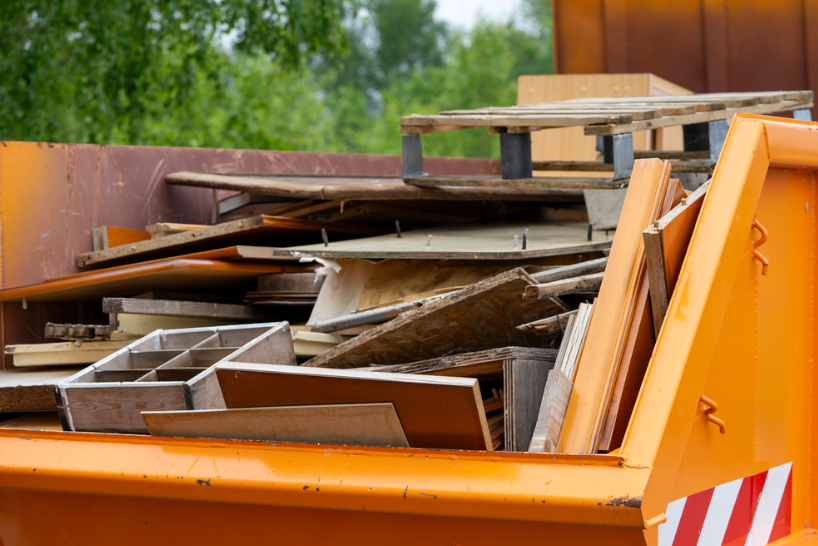 A dumpter rented to clean out junky space. Everyday Junk Removal and Hauling Services.