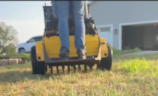 lawn aeration| St.Charles MO | Hackmann Lawn & Landscape