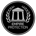 A logo for empire protection with a building and laurel wreath
