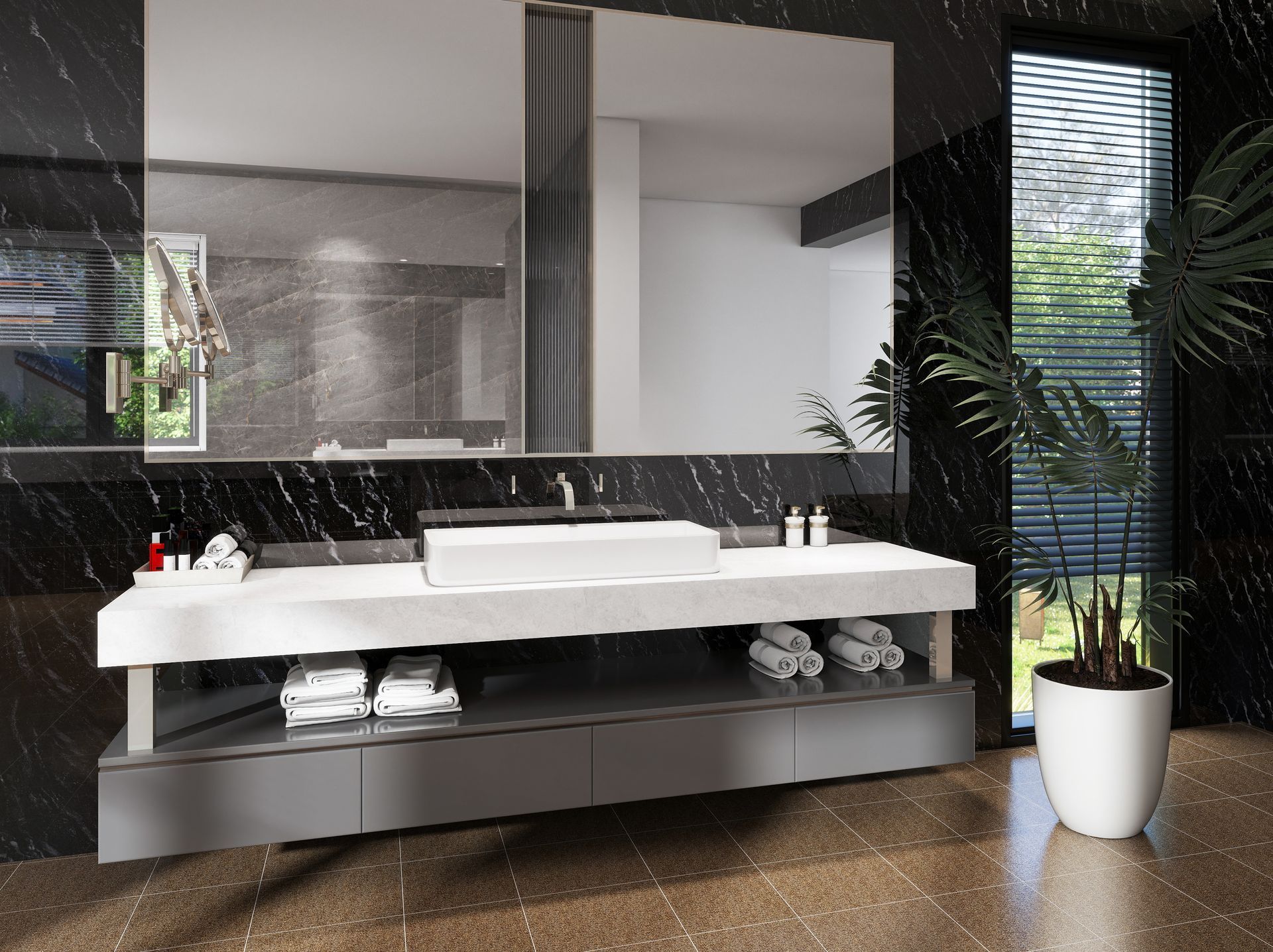 Baño moderno con lavabo blanco, espejo grande, pared de azulejos oscuros y planta en maceta.