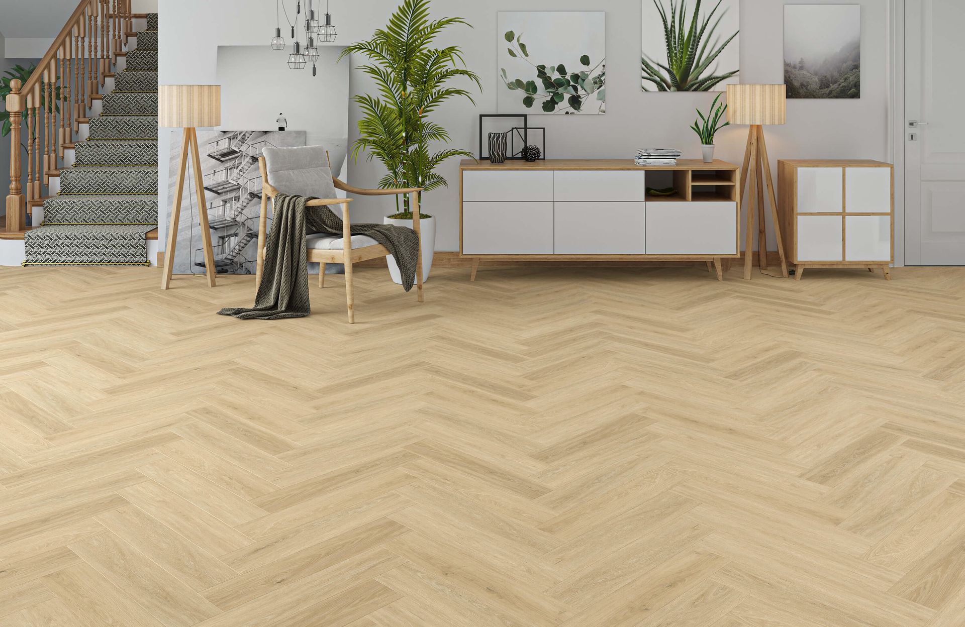 Luminoso salón con suelo de madera en espiga, mesa de comedor, plantas, escalera y aparador.