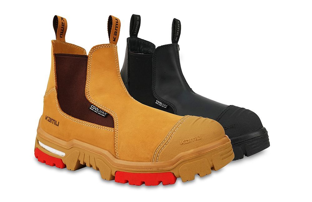 A pair of safety boots with red soles on a white background.