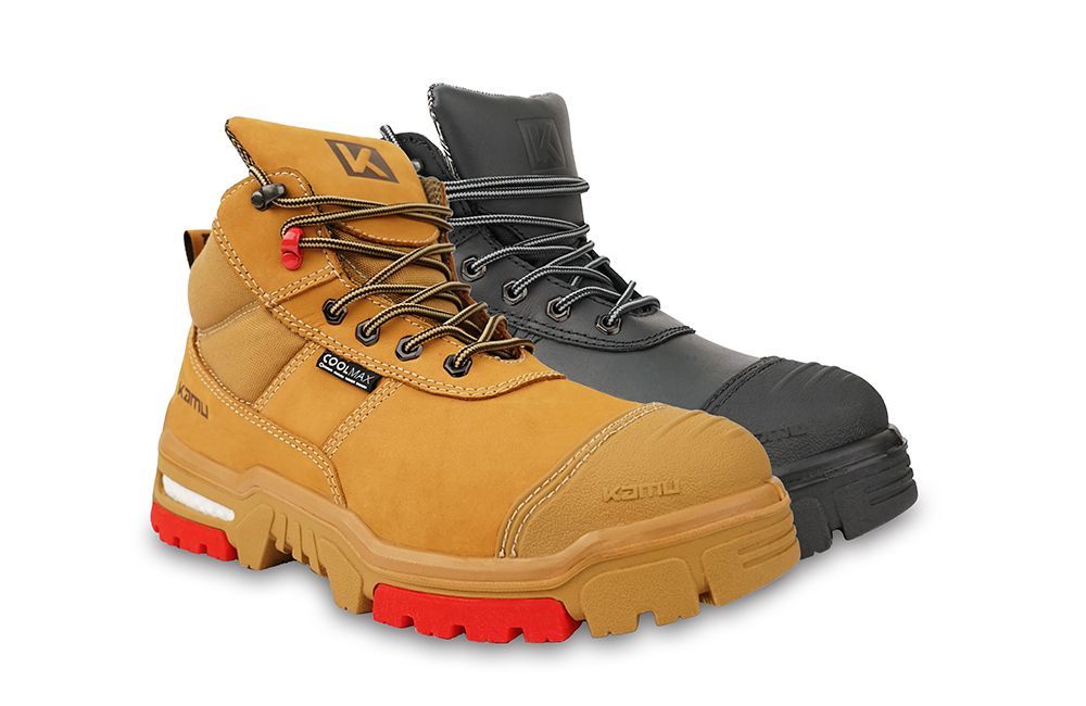 A pair of brown and black safety boots on a white background.