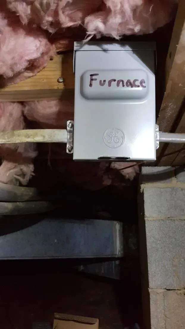 Gray electrical box labeled 