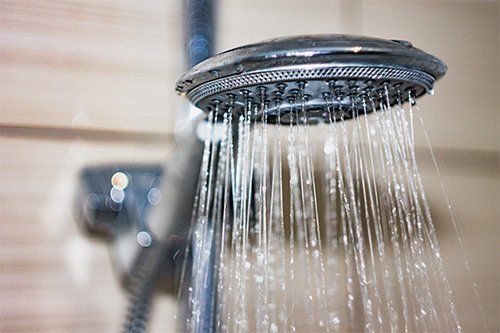 Shower Head With Water Flowing – Coral Springs, FL – Moody Plumbing Inc.