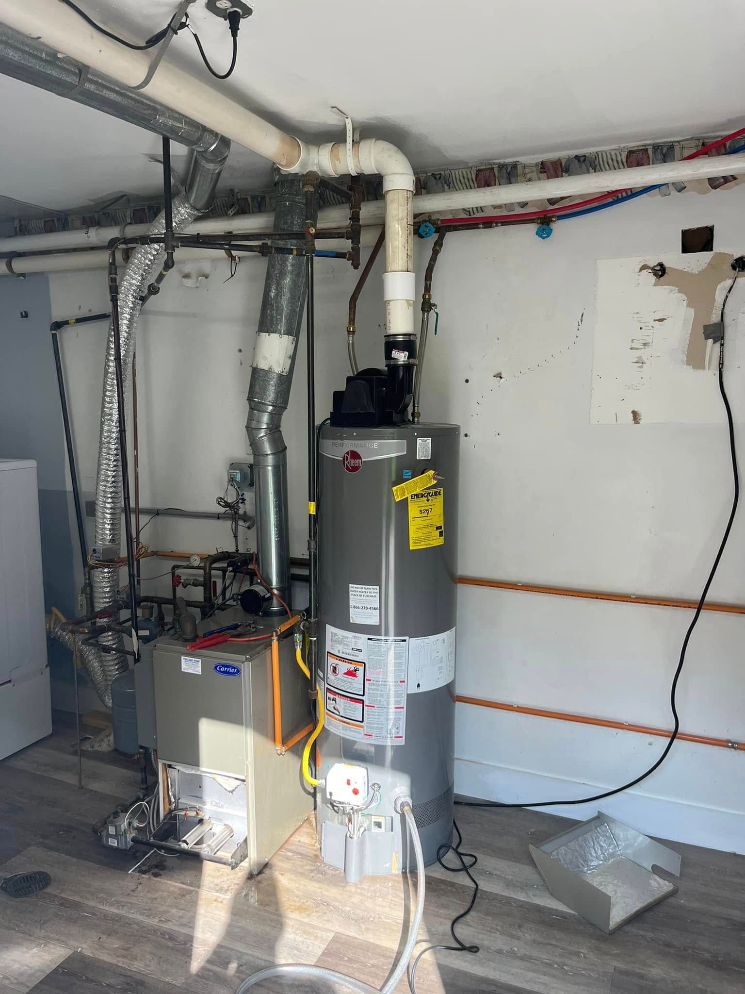 There is a water heater in the middle of the room.