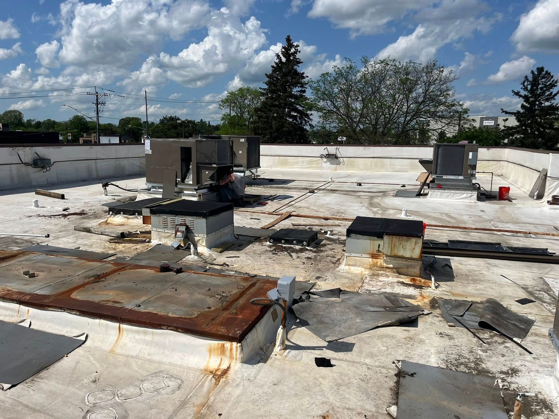 A roof with a lot of pieces of metal on it