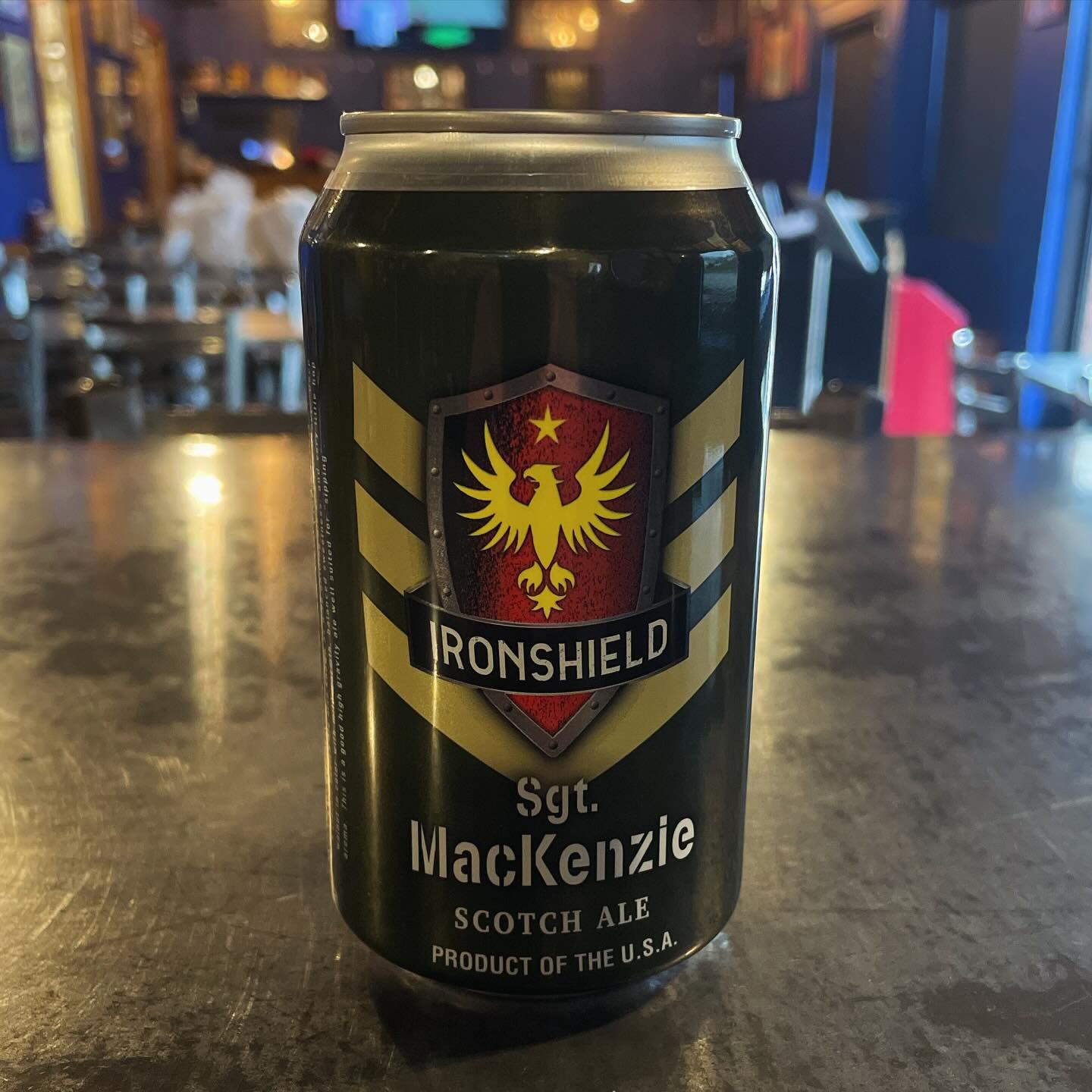 A can of ironshield scotch ale sits on a counter