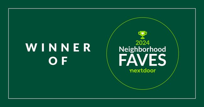 A green sign that says `` winner of neighborhood faves next door ''