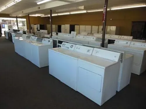 Row of White Washers and Dryers in A Store — Belleville, IL — Midwest Used Appliance & Repair