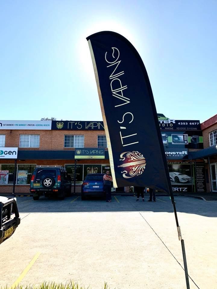 Black Flag with It's Vaping Text Outside a Vape Shop — Stuckup Industries in Central Coast, NSW