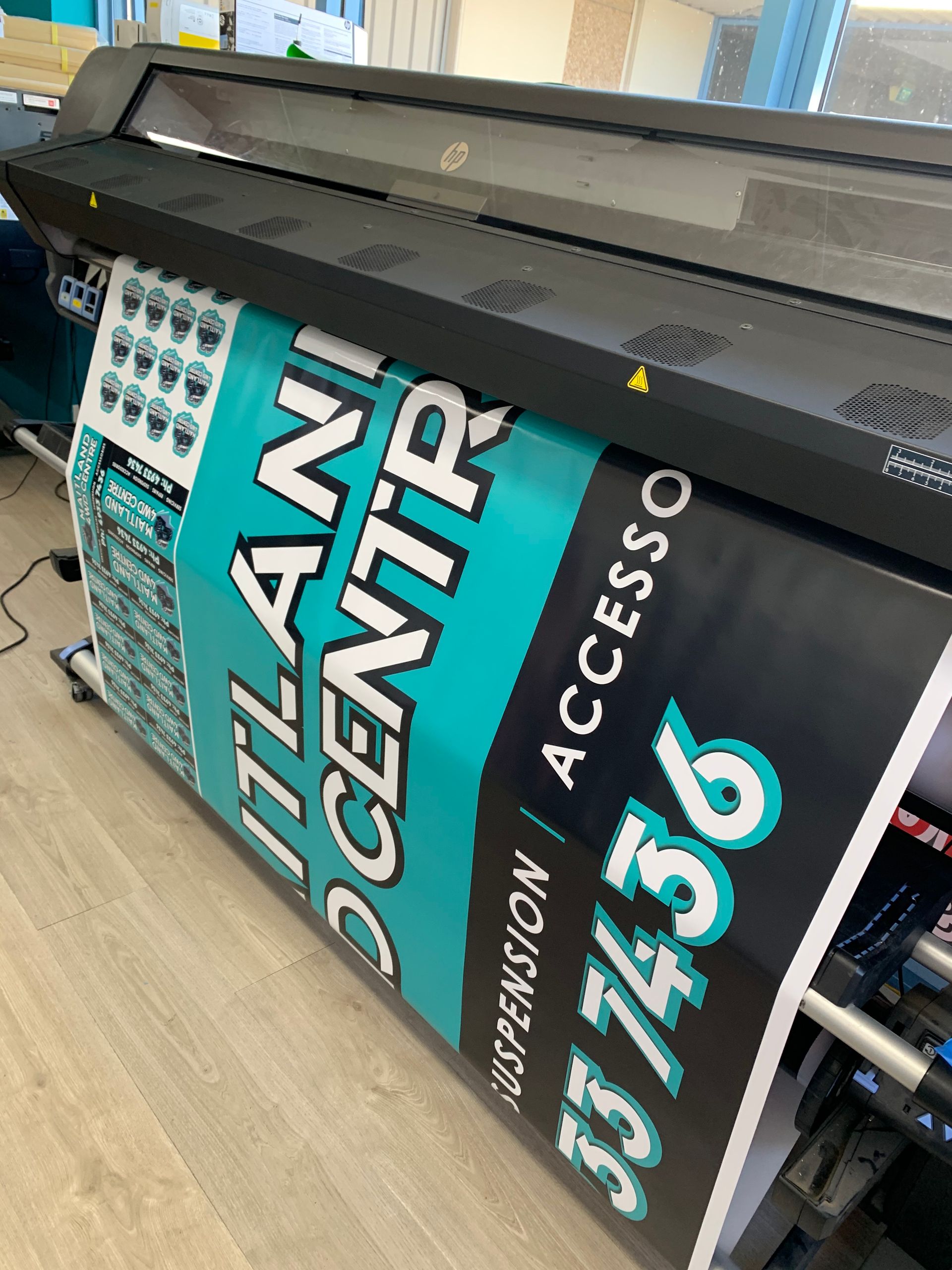 Banner Printing on A Large Format Printer — Stuckup Industries in Morisset, NSW