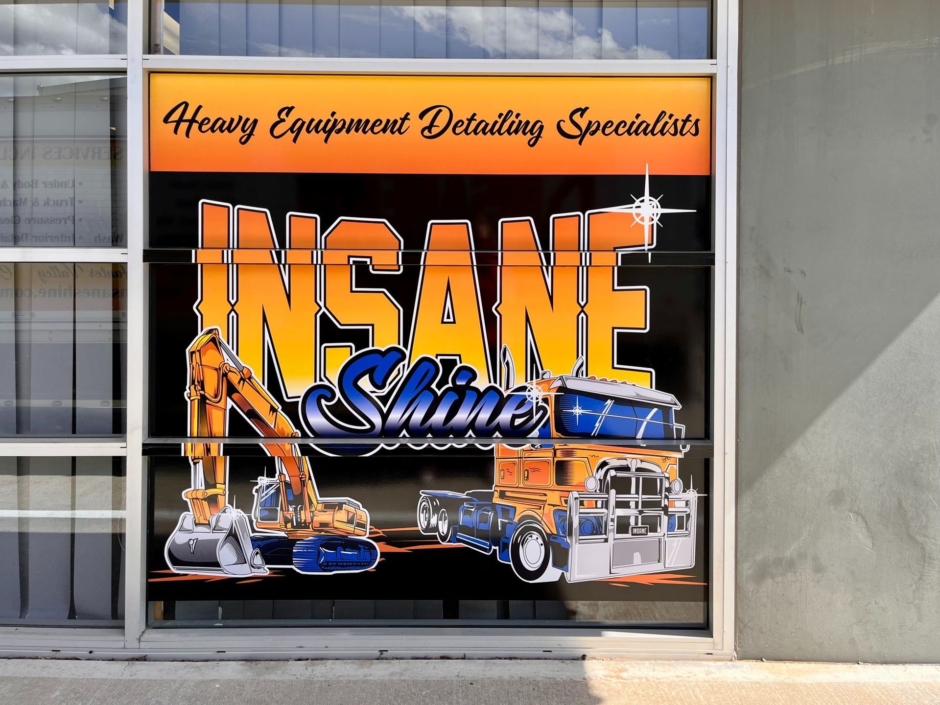 Window sign for Insane Shine, a heavy equipment detailing company — Stuckup Industries in Morisset, NSW