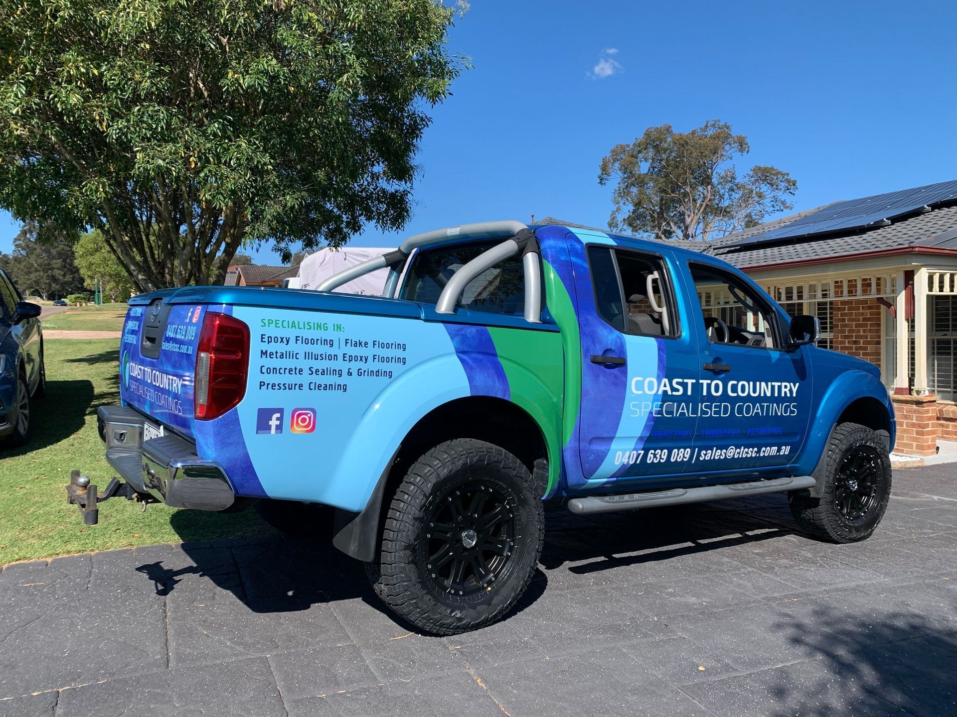 Blue Coast to Country Truck with Black Wheels — Stuckup Industries in Central Coast, NSW